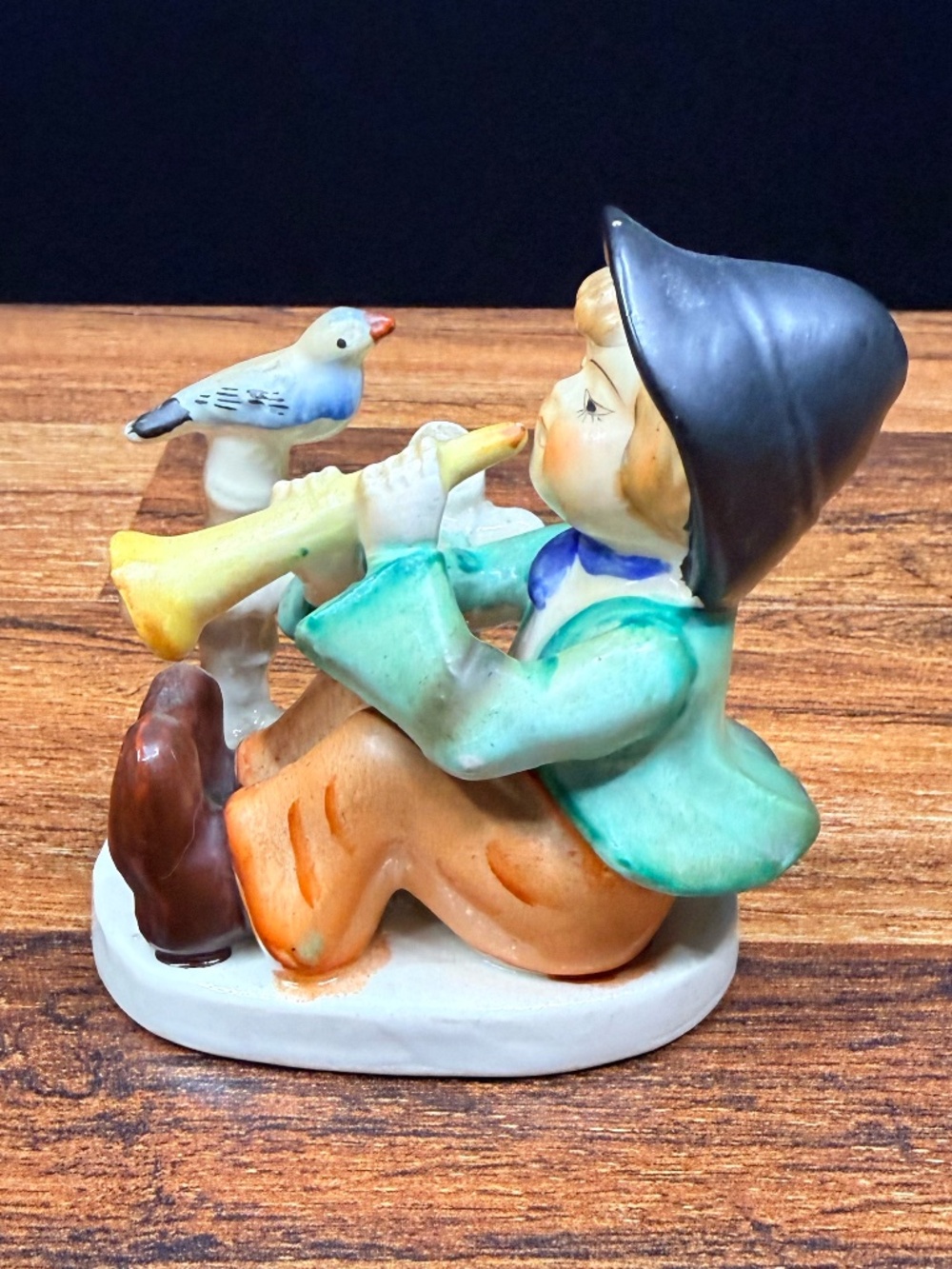 Figurine of Boy Playing Horn - Picture 2 of 15